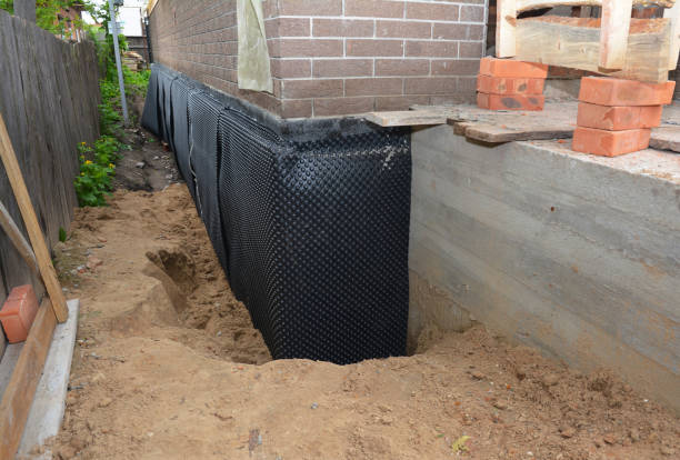 Happy homeowners after waterproofing job in Stockton